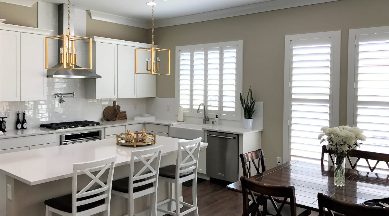 Plantation shutters with hidden tilt